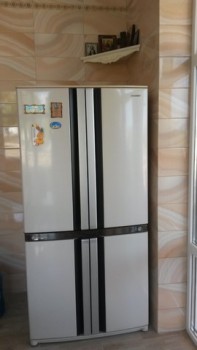 Над холодильником я маленькую полочку с иконами повесила.